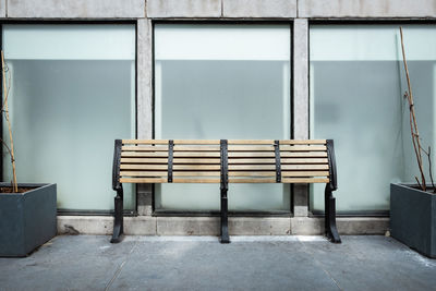 Empty chairs against wall