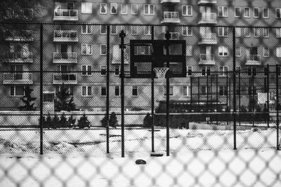 Basketball court against building