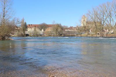 Scenic view of river against clear sky