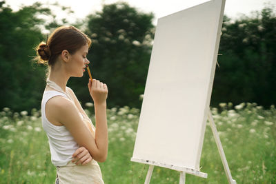 Young woman using mobile phone