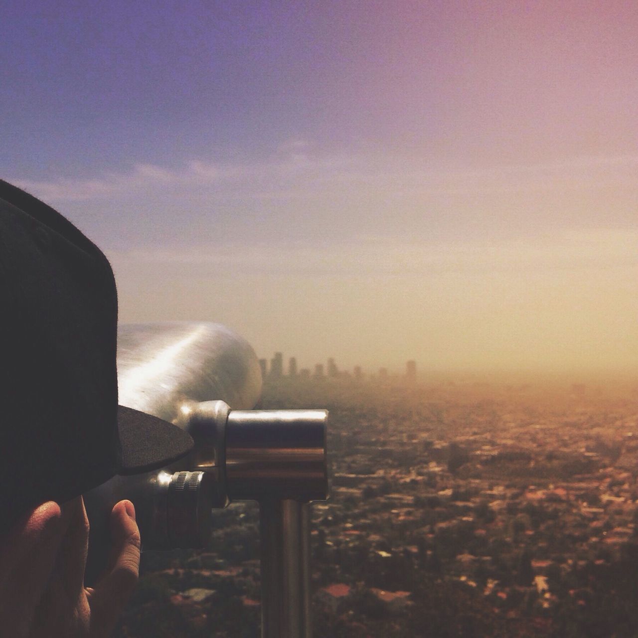 person, holding, sky, part of, cropped, focus on foreground, human finger, indoors, unrecognizable person, sunset, close-up, cloud - sky, built structure, communication, dusk, personal perspective