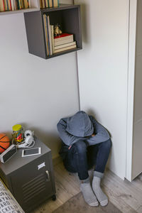 Low section of man working at home