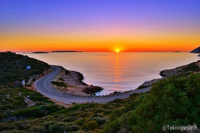 Scenic view of sea at sunset