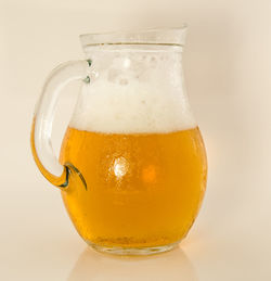 Close-up of drink over white background