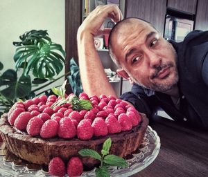 Portrait of man with fruits