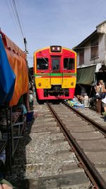 Train on railroad track against sky