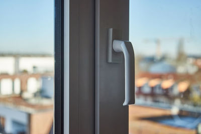 Close-up of window against sky