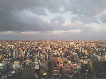 Aerial view of cityscape against sky