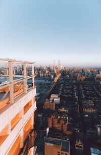 High angle view of buildings against clear sky