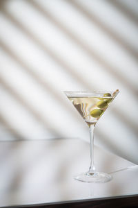 Close-up of wineglass on table