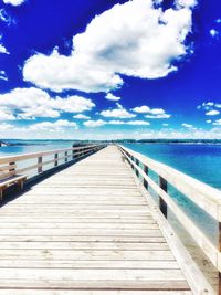 Pier over sea against sky