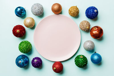 High angle view of multi colored candies on table