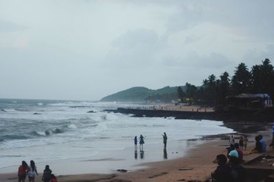 High angle view of tourists on beach