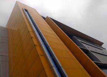 Low angle view of modern building against sky