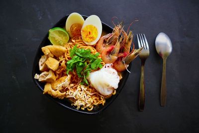 Laksa, laksa curry made from vermicelli, noodles, laksa served on bowl, isolated on white background