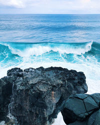 Scenic view of rocks in sea