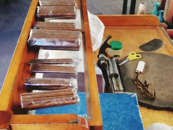 High angle view of paintbrushes on table