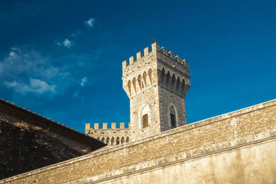 Low angle view of fort against blue sky