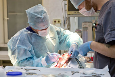 Midsection of woman working at clinic