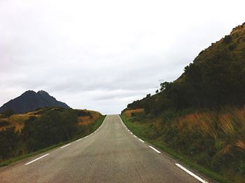 Road on mountain against sky