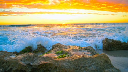 Scenic view of sea during sunset