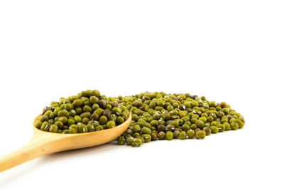 Close-up of green beans against white background