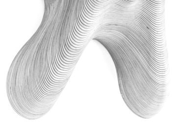 Close-up of curves drawn on paper