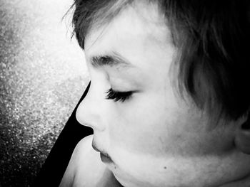 Close-up portrait of boy looking away