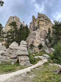 Low angle view of rocks against sky