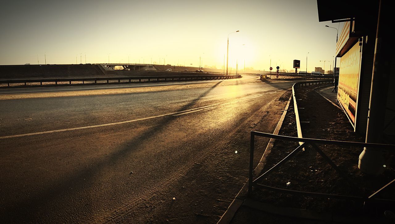 transportation, built structure, road, no people, sunset, sky, car, building exterior, land vehicle, outdoors, architecture, city, nature, day