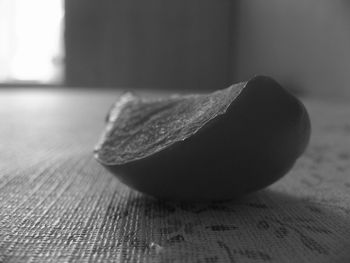 Close-up of leaf on table