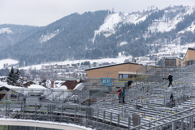 High angle view of buildings in city during winter