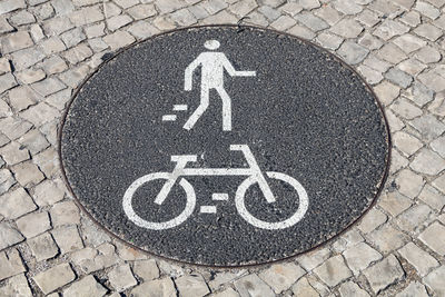 High angle view of bicycle sign on road