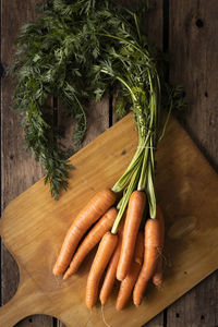 High angle view of vegetables on cutting board