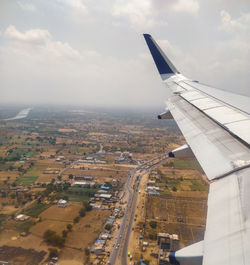 Aerial view of city against sky