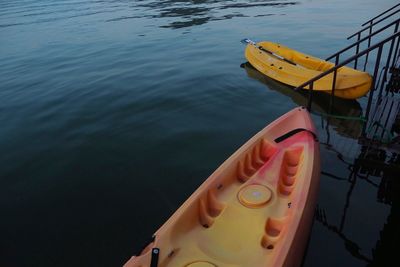 High angle view of yellow moored by lake