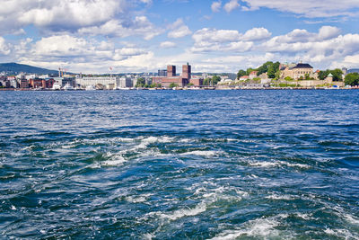 View of sea with buildings in background