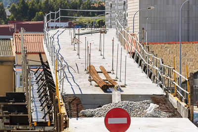 Construction site by railing during winter