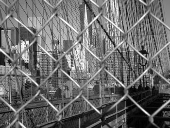 Metal structure seen through chainlink fence