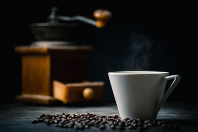 Close-up of coffee cup on table