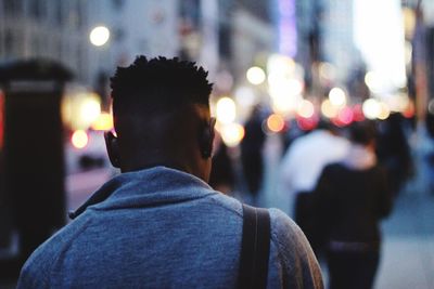 Rear view of man on street