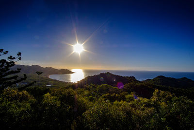 Scenic view of mountains against sky during sunset