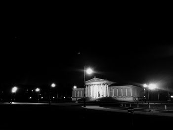 Illuminated street light at night