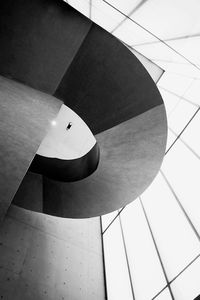 Low angle view of pendant light against wall