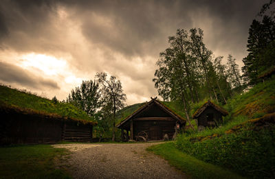 House on field against sky