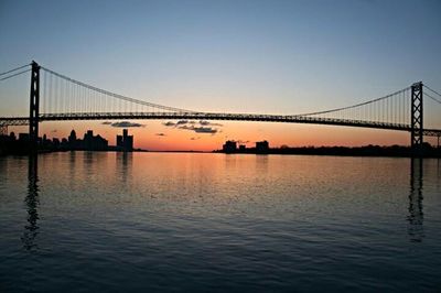 View of suspension bridge at sunset