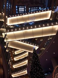 Low angle view of illuminated ferris wheel