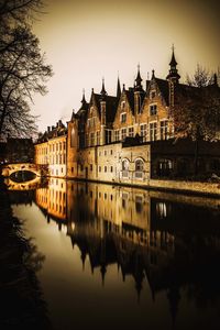 Church reflecting in canal