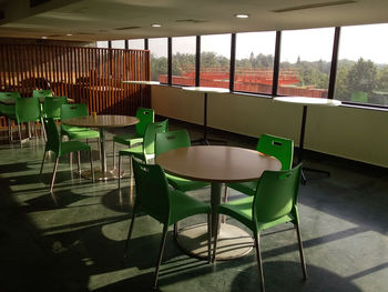 Empty chairs and table in restaurant