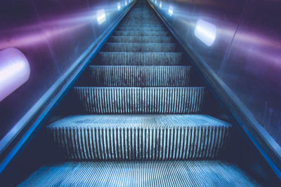 Low angle view of escalator in subway